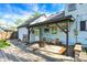 Inviting backyard deck with outdoor seating, partially shaded, a perfect space for outdoor relaxation at 2221 Douglas Rd, Indianapolis, IN 46220