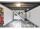 Unfinished basement featuring concrete walls and floors at 2221 Douglas Rd, Indianapolis, IN 46220