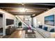 Finished basement with living space and stairs at 2221 Douglas Rd, Indianapolis, IN 46220