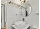 Chic bathroom featuring a vessel sink, modern fixtures, and stylish mirror at 2221 Douglas Rd, Indianapolis, IN 46220