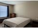 Bright bedroom with neutral walls, and a window providing natural light at 2324 Harvest Moon Dr, Indianapolis, IN 46229