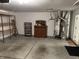 Spacious garage with shelving, storage, water heater and furnace at 2324 Harvest Moon Dr, Indianapolis, IN 46229