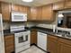 Efficient kitchen offering ample cabinet storage, essential appliances, and a functional layout at 2324 Harvest Moon Dr, Indianapolis, IN 46229