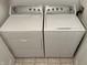 Bright laundry room features a white Whirlpool washer and dryer set, offering efficient laundry solutions at 2324 Harvest Moon Dr, Indianapolis, IN 46229