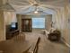 Inviting living room with ceiling fan, and comfortable seating, creating a cozy atmosphere at 2324 Harvest Moon Dr, Indianapolis, IN 46229
