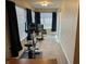 Bright office with exercise equipment, a gray chair, and natural light at 2324 Harvest Moon Dr, Indianapolis, IN 46229