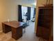 Office area with desk, exercise equipment, shelving unit and natural light at 2324 Harvest Moon Dr, Indianapolis, IN 46229