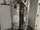 Water heater and furnace system installed on a concrete basement floor at 2324 Harvest Moon Dr, Indianapolis, IN 46229