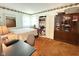 Bedroom features floral wallpaper and orange carpet at 2350 Brewer Dr, Indianapolis, IN 46227