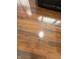 Stunning closeup of wood floor with natural sunlight reflecting on the surface at 2350 Brewer Dr, Indianapolis, IN 46227