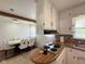 Kitchen featuring an island cooktop and adjoined dining space at 2350 Brewer Dr, Indianapolis, IN 46227