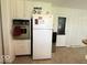 Kitchen with vintage oven and refrigerator at 2350 Brewer Dr, Indianapolis, IN 46227