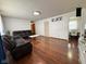 Open-concept living room with hardwood floors and ample space for relaxation and entertaining at 2350 Brewer Dr, Indianapolis, IN 46227