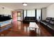 Stylish living room featuring hardwood floors, modern decor, and comfortable seating arrangements at 2350 Brewer Dr, Indianapolis, IN 46227