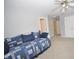 Bedroom featuring a daybed, neutral carpet and ceiling fan at 2363 N Pennsylvania St, Indianapolis, IN 46205