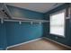Walk-in closet featuring custom shelving and ample storage space at 2363 N Pennsylvania St, Indianapolis, IN 46205
