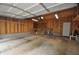 Spacious two-car garage with ample storage space and side access door providing convenience and functionality at 2363 N Pennsylvania St, Indianapolis, IN 46205