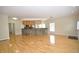 Large living room with hardwood floors and a view into the kitchen bar, plenty of space at 2363 N Pennsylvania St, Indianapolis, IN 46205