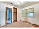 Bedroom with carpet, closet, and a window offering natural light at 2842 Sangster Ave, Indianapolis, IN 46218