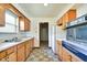 Bright kitchen with classic cabinetry and a view of the backyard at 2842 Sangster Ave, Indianapolis, IN 46218