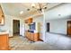 Kitchen featuring retro appliances, a window, and vinyl flooring at 2842 Sangster Ave, Indianapolis, IN 46218