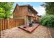 This townhome features a wood deck and partially fenced backyard at 3165 Sycamore Dr, Columbus, IN 47203