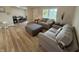 Bright and airy living room featuring new floors, neutral paint, and modern furniture arrangement at 3209 Pebblebrook Dr, Elwood, IN 46036