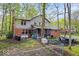 Expansive backyard with lush greenery, patio area, and serene setting at 3444 Briar Pl, Carmel, IN 46033