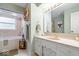 Bright bathroom with a bath tub, stylish mirrors, and modern fixtures at 3444 Briar Pl, Carmel, IN 46033