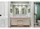 Well-lit bathroom featuring double mirrors and a clean, functional layout at 3444 Briar Pl, Carmel, IN 46033