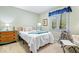 Comfortable bedroom with a twin bed, plenty of natural light, and neutral tones at 3444 Briar Pl, Carmel, IN 46033
