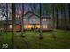 Charming two-story home with brick and siding, nestled among trees, offering a serene and private setting at 3444 Briar Pl, Carmel, IN 46033