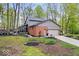 Exterior view of home with screened-in porch and large backyard at 3444 Briar Pl, Carmel, IN 46033