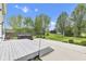 Enjoy the outdoors with this backyard with a concrete patio, hot tub, and a green lawn perfect for outdoor enjoyment at 3652 Newberry Rd, Plainfield, IN 46168