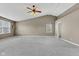 Spacious bedroom featuring vaulted ceilings, ceiling fan, and two windows for ample natural light at 3652 Newberry Rd, Plainfield, IN 46168