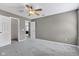 Bedroom featuring carpet floors, neutral walls, ceiling fan and access to closet and living area at 3652 Newberry Rd, Plainfield, IN 46168
