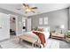 Cozy bedroom features soft lighting, bright windows, and hardwood floors at 3652 Newberry Rd, Plainfield, IN 46168