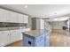 Kitchen with stainless steel appliances, granite countertops, a central island, and an open floor plan at 3652 Newberry Rd, Plainfield, IN 46168