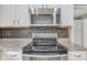 Modern kitchen featuring stainless steel appliances, granite countertops, and contemporary backsplash at 3652 Newberry Rd, Plainfield, IN 46168