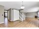 Spacious living room with hardwood floors and a fireplace, creating a warm, inviting atmosphere at 3652 Newberry Rd, Plainfield, IN 46168