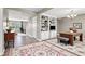 Bright living room features hardwood floors, built-in shelving, and natural light at 3652 Newberry Rd, Plainfield, IN 46168