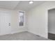 Bright bedroom features soft carpet, white trim and walls, and natural light at 3845 Cornelius Ave, Indianapolis, IN 46208