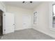 Neutral bedroom features soft carpet, two closets, white trim, and natural light at 3845 Cornelius Ave, Indianapolis, IN 46208
