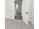 A cozy bedroom features neutral walls, plush carpet and an open doorway, creating a relaxing atmosphere at 3845 Cornelius Ave, Indianapolis, IN 46208