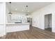 Bright kitchen featuring a large island and stainless steel appliances at 3845 Cornelius Ave, Indianapolis, IN 46208