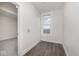 A functional laundry room with sleek flooring provides space for laundry appliances and storage at 3845 Cornelius Ave, Indianapolis, IN 46208