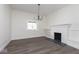 Bright living room featuring a classic fireplace and fresh paint at 3845 Cornelius Ave, Indianapolis, IN 46208