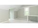 Spacious bedroom with vaulted ceilings, fresh carpets, neutral paint, and plenty of natural light at 400 N Sycamore St, Martinsville, IN 46151