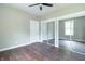 Spacious bedroom with a closet, ceiling fan and a mirrored closet door at 400 N Sycamore St, Martinsville, IN 46151