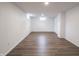 Unfinished basement showcasing a large open area with vinyl flooring and window at 4029 N Euclid Ave, Indianapolis, IN 46226